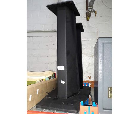 A pair of black speaker stands