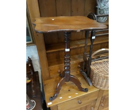 A 19th century tripod table with turned pillar 