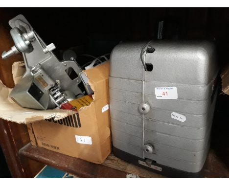 A box of film editors, a Bell &amp; Howell cine projector and a screen 