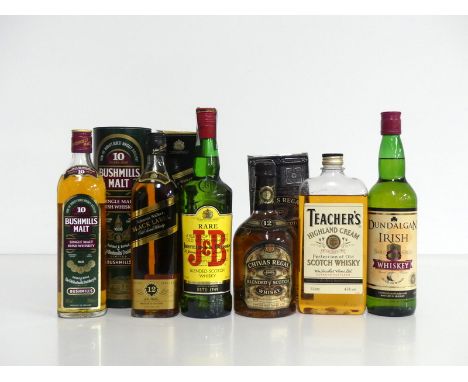 1 70-cl bt Bushmills 10YO Single Malt Irish Whiskey 40% original tube 1 70-cl bt Johnnie Walker Black Label 12YO Extra Specia