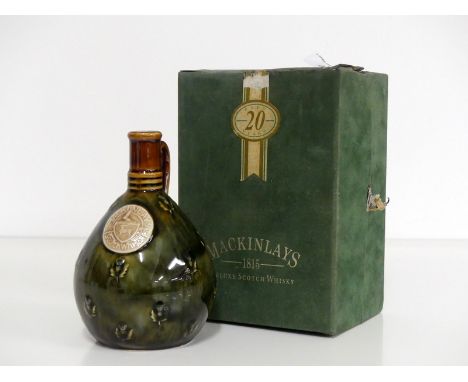 1 75-cl bt Mackinlays 20 YO Scotch Whisky Commemorative Wade Decanter to mark 175 years, established 1815, broken stopper in 