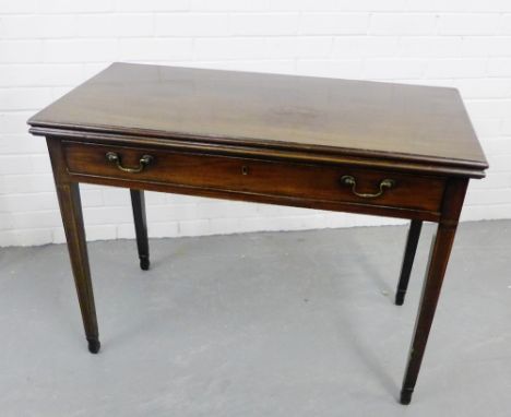 A 19th century mahogany side table, the rectangular top with moulded edge, over a single long drawer, raised on tapering legs