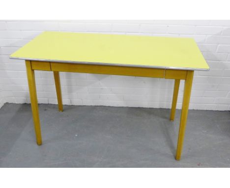 A retro yellow Formica topped pine kitchen table, 77 x 122cm 