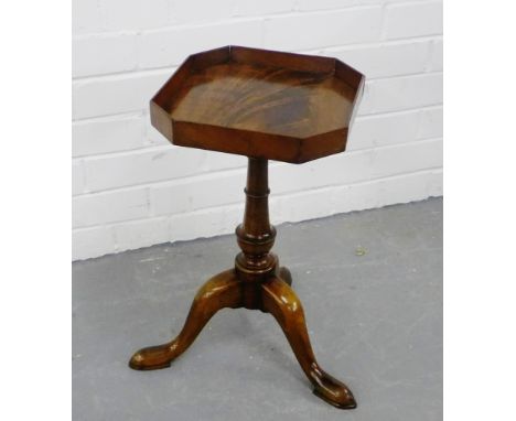 A mahogany wine table, the square top with canted corners, raised on baluster column and tripod supports, 48 x 26cm