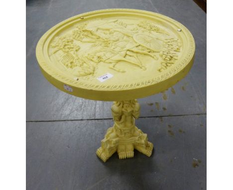 A resin circular topped table