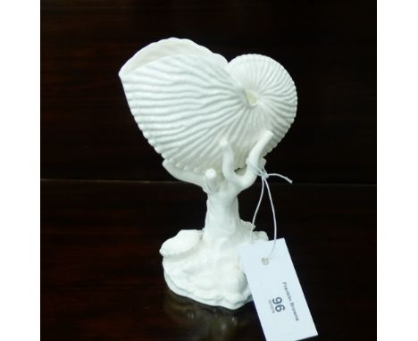 A Royal Worcester white glazed shell vase on a naturalistic base, 16cm high
