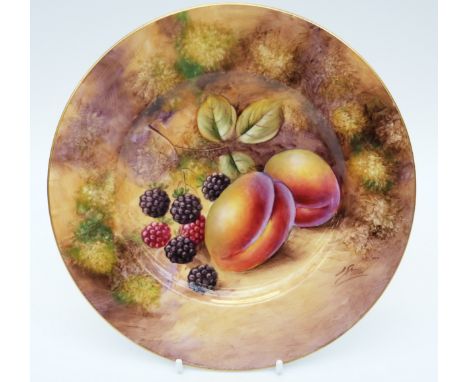 A Royal Worcester painted fruit plate signed J Smith, diameter 20cm
