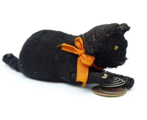 Clockwork tinplate cat and caged mouse with black fur and orange bow, 18cm long. 