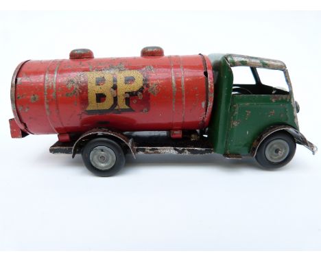 Tri-ang Minic clockwork tinplate BP Petrol Tanker with green cab, red tank, grey hubs, gilt transfers and original key