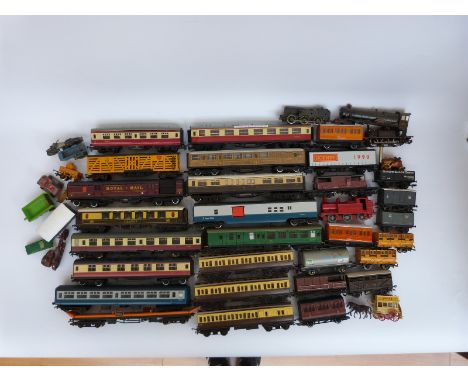 Thirty-five Hornby, Tri-ang, Bachmann and similar 00 gauge locomotives, coaches and wagons