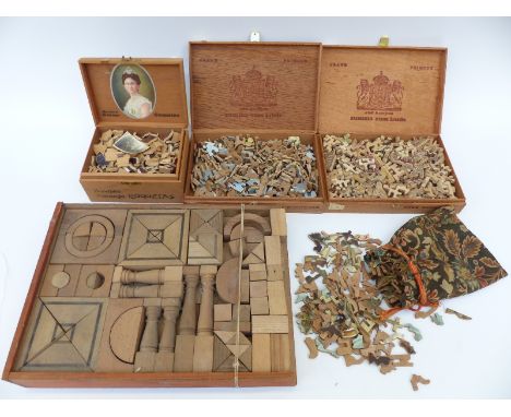 A collection of vintage wooden puzzles and building blocks