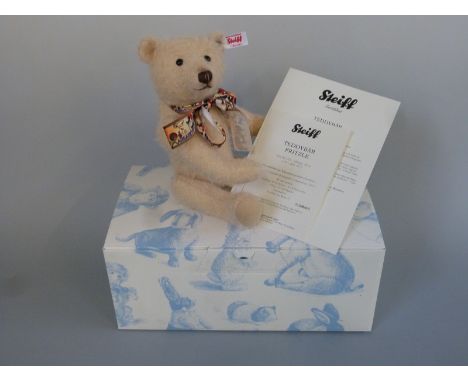 Steiff Teddy Bear Fritzle with beige mohair, decorated ribbon bow and jointed limbs, limited edition 942/1880, 28cm tall, wit