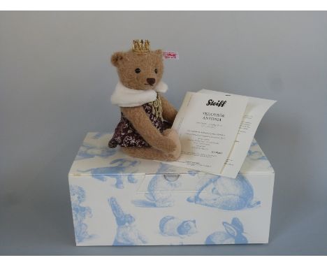 Steiff Teddy Bear Antonia with cafe au lait mohair, dress, crown and jointed limbs, limited edition 832/1500, 24cm tall, with