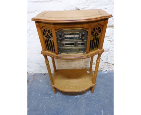 Modern radio, CD and tape machine in vintage style cabinet 