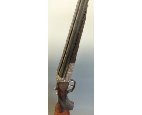 H Burgsmuller 16 bore side by side shotgun with engraved scenes of animals to the locks, engraved top plate, top levered unde