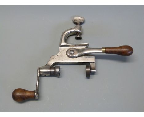 French steel cartridge loading tool with turned wooden handles stamped A R Marque Deposee Armes et Cycles Manufacture Francai