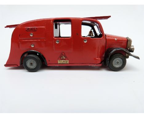 Tri-ang Minic clockwork tinplate London Fire Engine with red and black body, cream tyres, working headlights and original key
