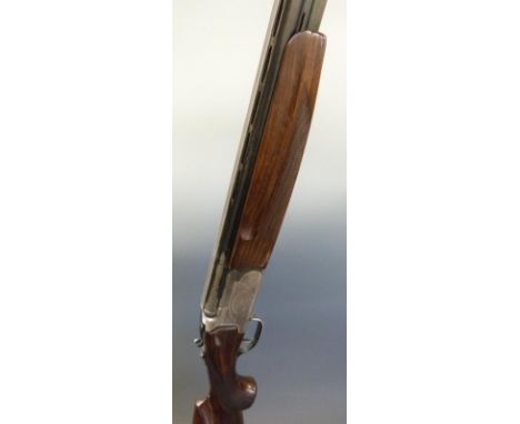 Lanber 12 bore over and under ejector shotgun with scrolling engraving to the lock, top lever and underside, chequered semi-p