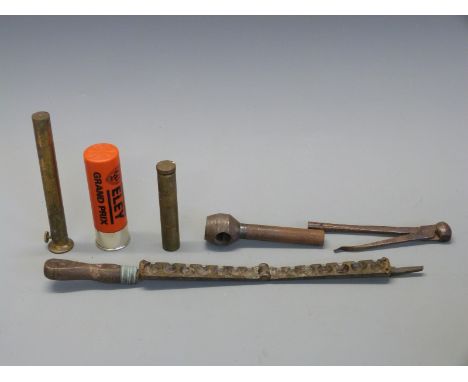 Six various gun related tools and accessories including a graduated bullet mould, brass oil bottle stamped 'Gabriel Birm' und