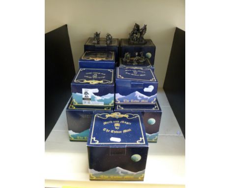 A collection of boxed Myth and Magic collectable figures