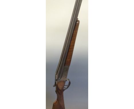 Sabel .410 side by side shotgun with border engraved lock, top plate and underside, chequered grip and forend, double trigger