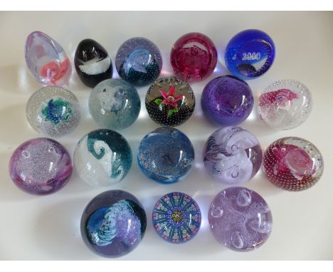 Seventeen Caithness Glass paperweights comprising Tidal Wave, Flower in the Rain, HM Queen Mother, Rose Dewdrops, Millennium 