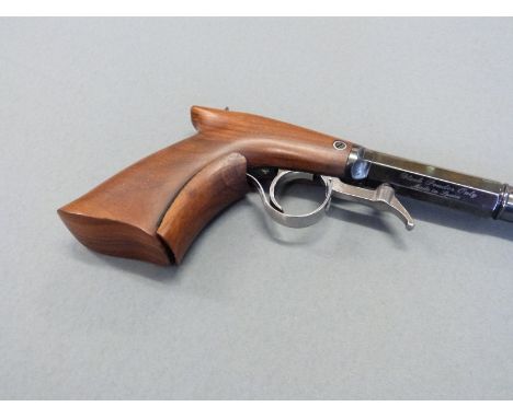 Ardesa .40 percussion under-hammer action pistol with shaped wooden grip, grip extension, open sights and 8.5 inch part octag