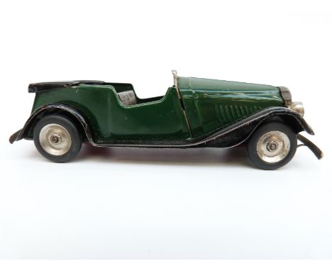 Tri-ang Minic clockwork tinplate Vauxhall Town car with green and black body, wooden seats and original key