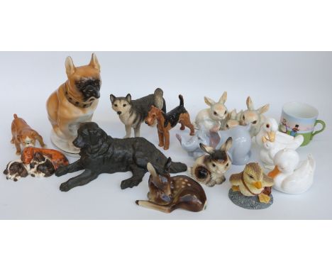 A group of various ceramic animal figures to include Royal Doulton Airedale, Royal Osborne, Nao, Goebel, large Lomonosov Fren