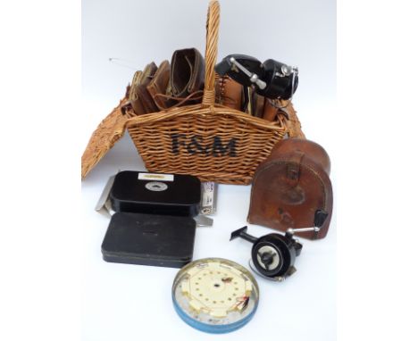 A collection of vintage leather cast wallets including Hardy empty leather reel box, Mitchell 300 fixed spool reel, Wheatley 