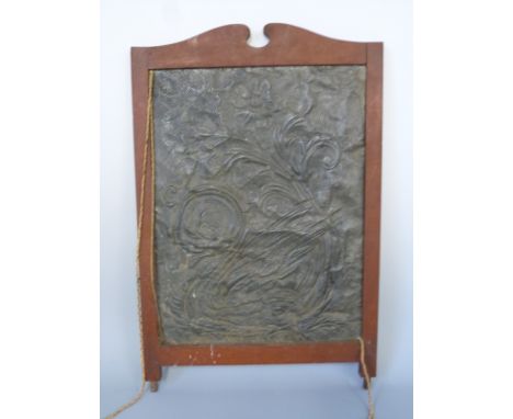 An Arts and Crafts pewter hammered panel, 70 x 45cm