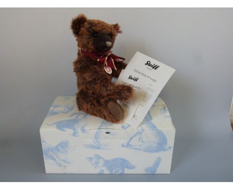 Steiff Teddy Bear Woody with brown tipped mohair, growler, bow and jointed limbs, limited edition 1161/1500, 38cm tall, with 