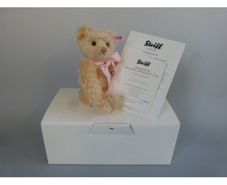 Steiff Teddy Bear Charlotte the Royal Baby with blonde mohair, blue ribbon, embroidered pad, gold plated pendant and jointed 