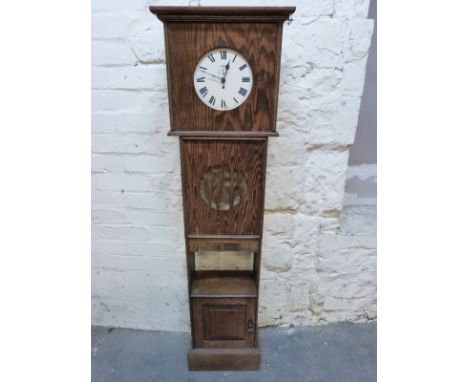 An Art Deco style oak clock with cupboard to base, height 150cm