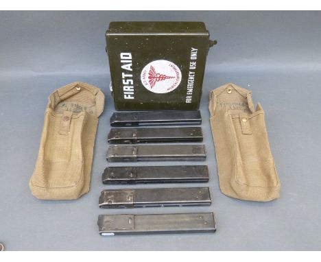 Six Sten gun magazines together with two British Army gun magazine pouches. 
