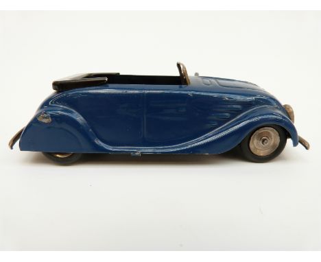 Tri-ang Minic clockwork tinplate Vauxhall Town car with green and black body, wooden seats and original key