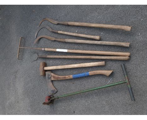 A quantity of garden hand tools including lawn edger, bill hooks etc 