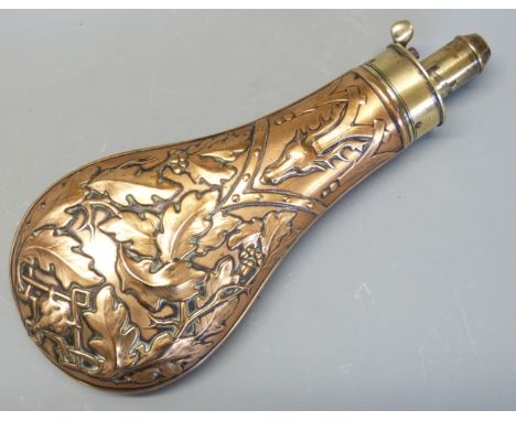 G & J W Hawksley copper and brass powder flask with embossed decoration of fox and deer masks amongst oak leaves, 20cm long. 