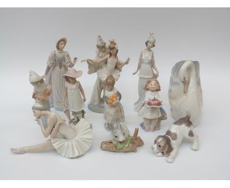 A collection of eleven Lladro and Nao figures 