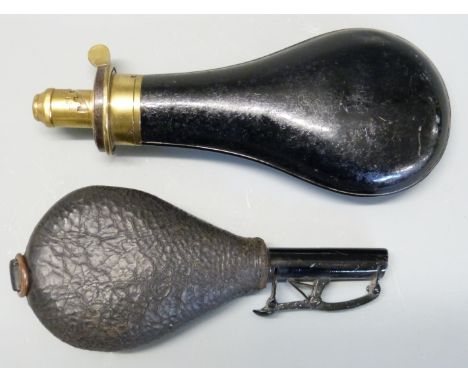 James Dixon & Sons Sheffield brass and painted powder flask and a leather shot flask, largest 20cm long. 
