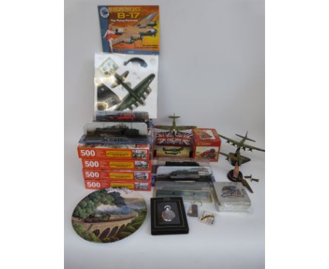 A collection of Atlas Editions model aeroplanes and trains, including Wings of Victory Spitfire in original box, together wit