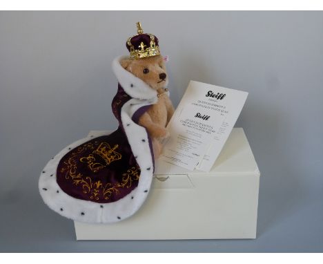 Steiff Teddy Bear Queen Elizabeth II Coronation with blonde mohair, cape, crown and jointed limbs, limited edition 1033/1953,
