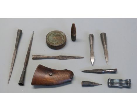 A pair of Smith & Wesson wooden revolver grips  together with seven metal crossbow bolt tips, a Terry's Magneto spanner set, 