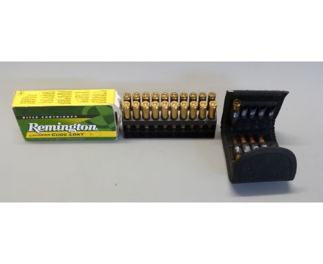 Twenty-five Remington Express Core Lokt .308 WIN 180gr rifle cartridges, twenty in original box and five in a travel pouch. P