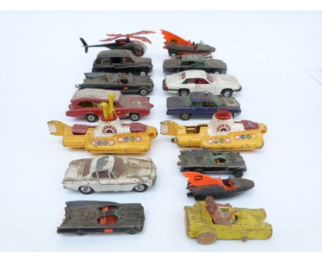 Fifteen Corgi Toys diecast model novelty, film and TV related vehicles including Batmobile, Batboat, Batcopter, Magic Roundab