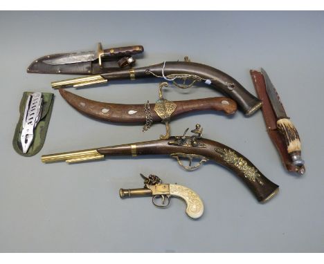 Seven replica pistols and knives including a pair of duelling pistols, antler handled hunting knife, Eastern dagger with inla