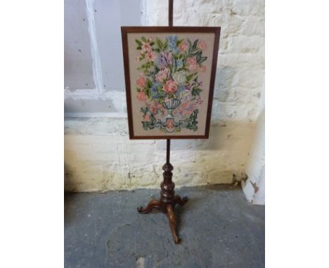 A 19thC pole screen with tapestry panel 