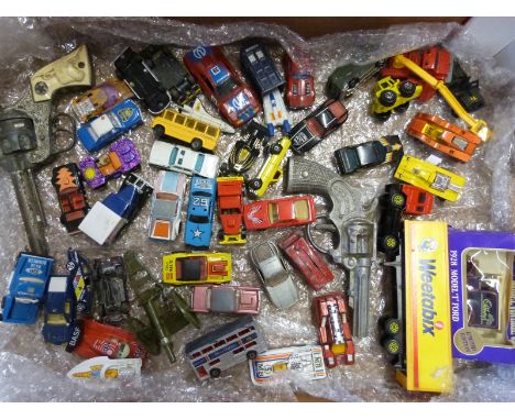 Over 50 Matchbox and similar diecast model vehicles and two toy guns