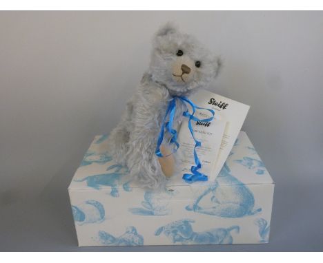 Steiff Teddy Bear Ice with light blue mohair, growler, shaved snout, blue ribbon and jointed limbs, limited edition 977/1500,