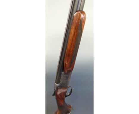 Miroku 800 12 bore over and under ejector shotgun with engraved lock, top plate, top lever, trigger guard and underside, 'B C